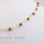 گردنبند یوناکیت|خواص سنگ یوناکیت|سنگ متولدین تیر